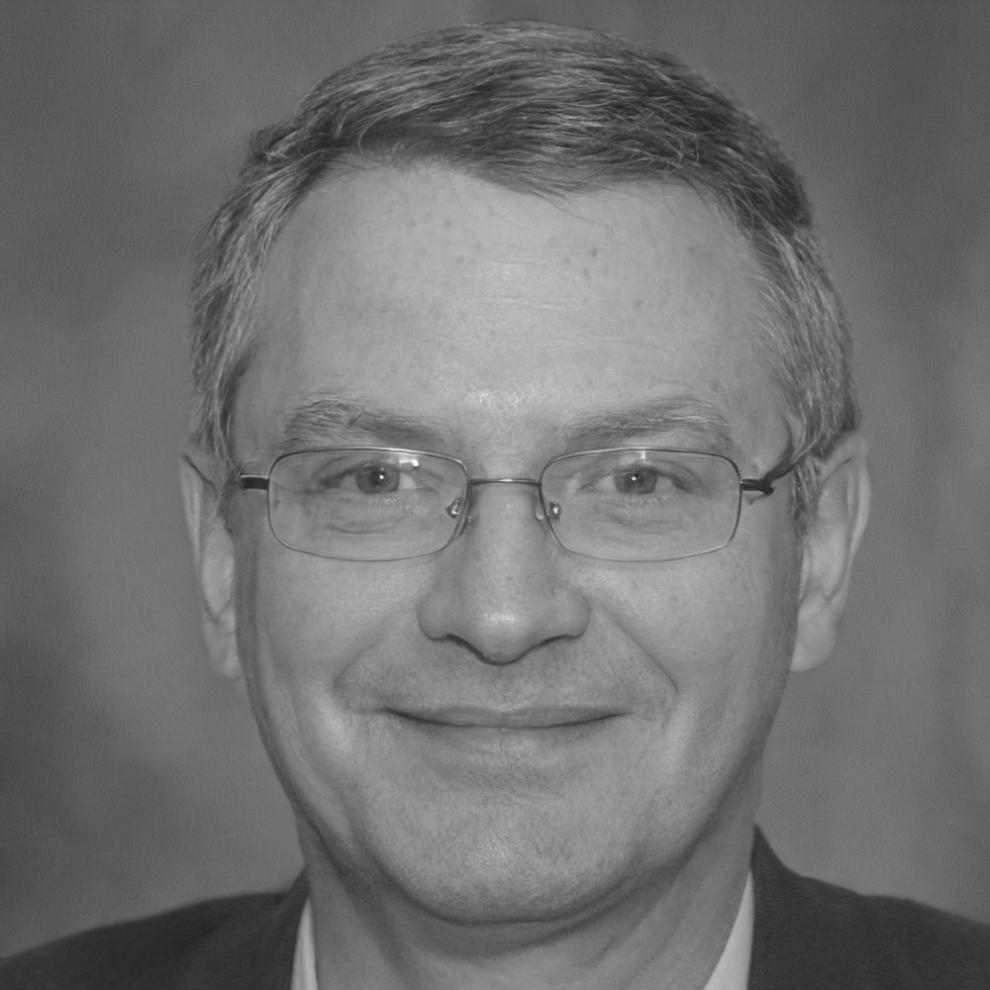 Professional headshot of financial methodology expert