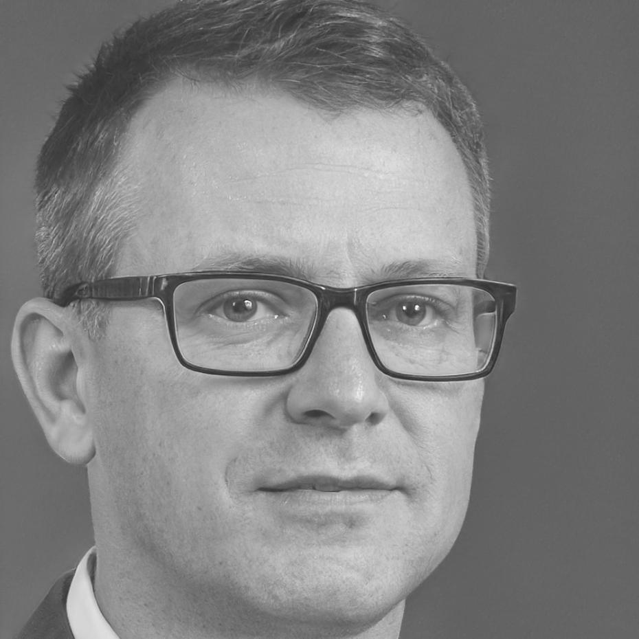 Professional headshot of budget systems analyst