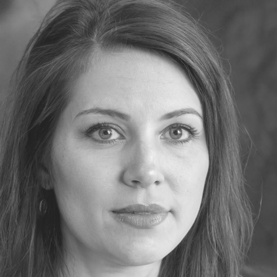 Professional headshot of financial education specialist